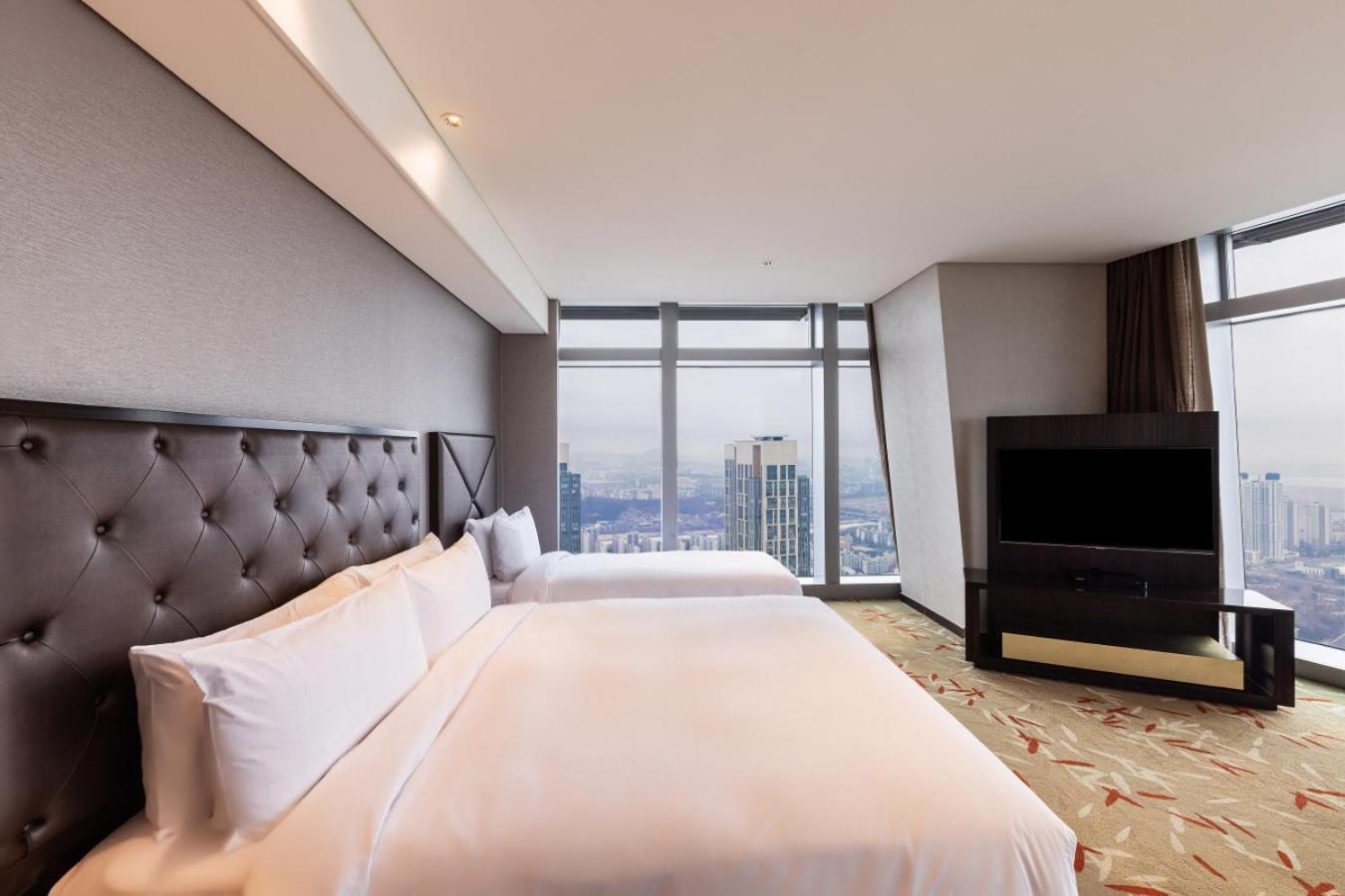 Aparthotel Oakwood Premier Inchon Habitación foto